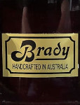 Brady gold rectangle badge